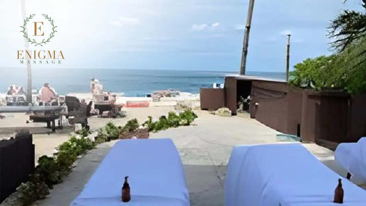 Mobile massage therapist setting up in a vacation rental